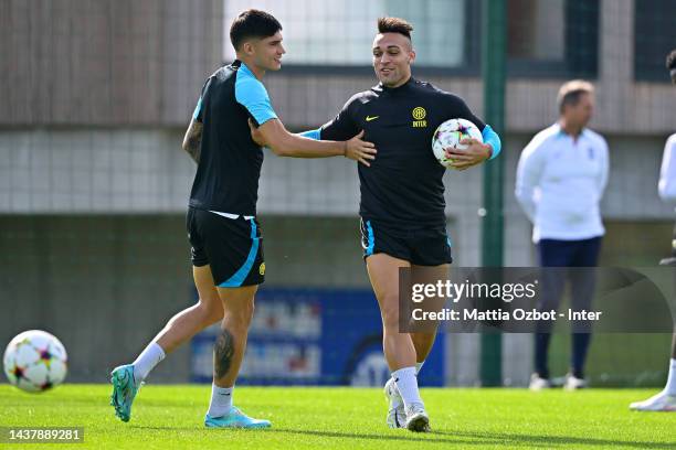 Lautaro Martinez of FC Internazionale and Joaquin Correa of FC Internazionale reacts during the FC Internazionale training session at the club's...