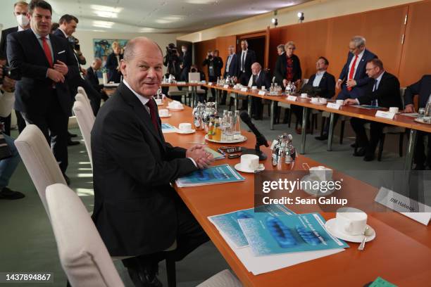 German Chancellor Olaf Scholz sits down for a meeting of an experts commission on energy policy recommendations following the presentation of the...