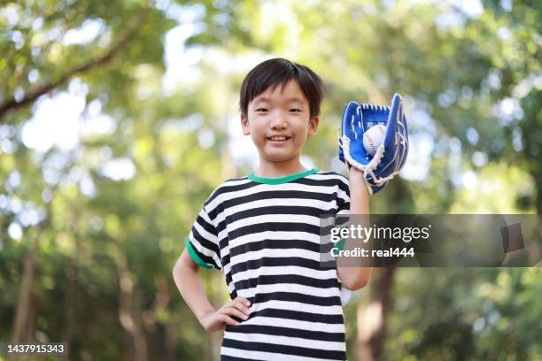 young boy playing baseball - playing catch stock pictures, royalty-free photos & images