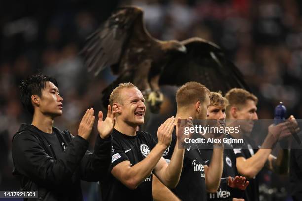 Sebastian Rode of Eintracht Frankfurt celebrates with teammates after the UEFA Champions League group D match between Eintracht Frankfurt and...