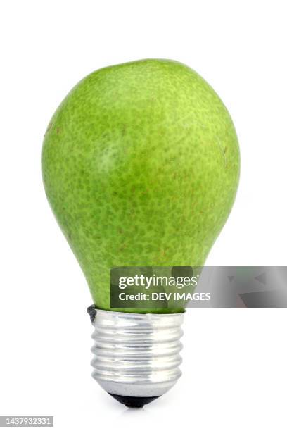 green pear- concept of eco bulb - pear stock pictures, royalty-free photos & images