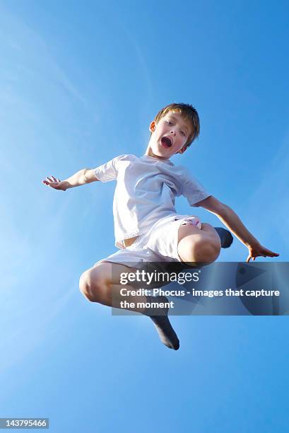 flying olympic ballet boy - pantalón corto blanco fotografías e imágenes de stock