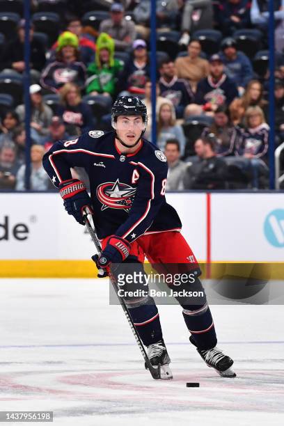 Zach Werenski of the Columbus Blue Jackets skates with the puck during the third period of a game against the Arizona Coyotes at Nationwide Arena on...