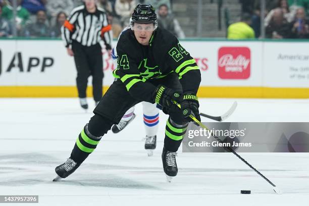 Roope Hintz of the Dallas Stars handles the puck against the New York Rangers at the American Airlines Center on October 29, 2022 in Dallas, Texas.