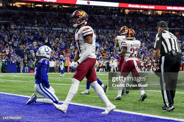 Terry McLaurin of the Washington Commanders reacts after making a catch in the fourth quarter against the Indianapolis Colts at Lucas Oil Stadium on...