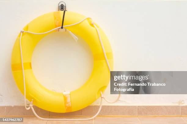 yellow float - life jacket isolated stock pictures, royalty-free photos & images