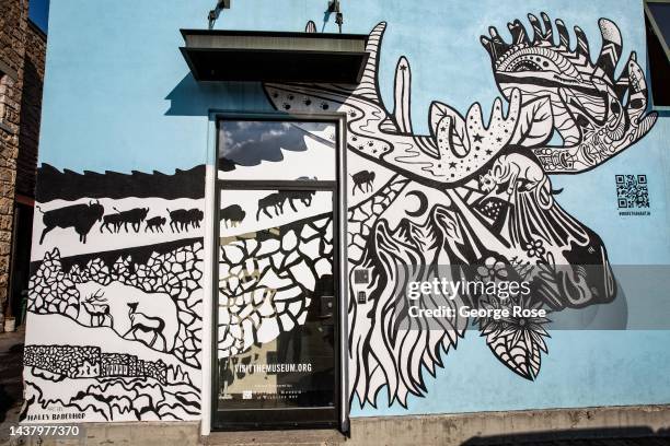 Wall mural of a moose, located across from the downtown square, is viewed on September 16 in Jackson, Wyoming. Located at the gateways to Yellowstone...