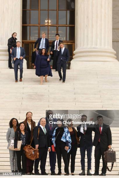 Attorney David Hinojosa poses for photographs with members of his legal team and students from the University of North Carolina outside the U.S....