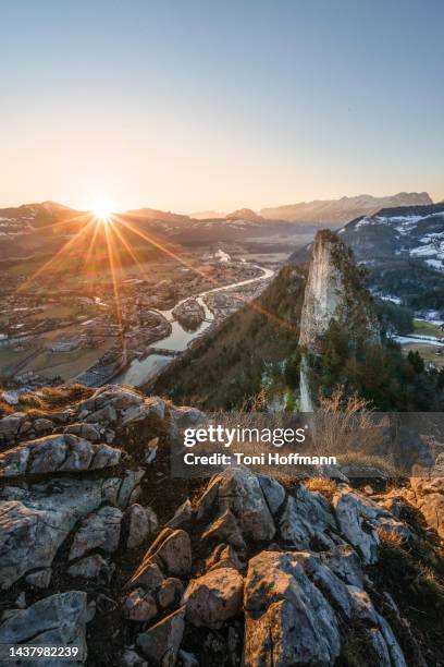 golden light at the kleiner und großer barmstein during sunrise with hallein and salzach - berchtesgaden - fotografias e filmes do acervo