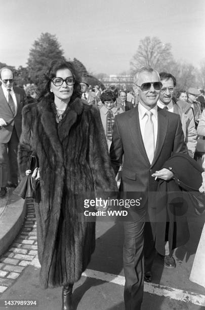 Television show host Johnny Carson with wife Joanna Holland in a fur coat at the inauguration of President Ronald Reagan in Washington D.C.