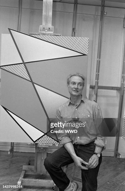 Outtake; Portrait of artist Roy Lichtenstein with one of his pieces in his studio on April 27, 1987 in New York...Article title: "Arts & People: Pop...