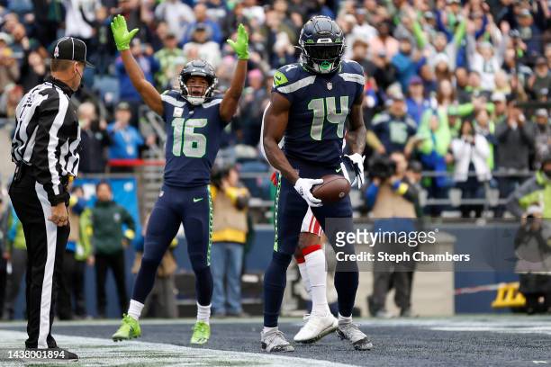 Metcalf of the Seattle Seahawks celebrates his touchdown against the New York Giants during the second quarter at Lumen Field on October 30, 2022 in...