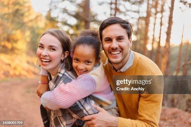 portrait of a happy family on a hike - adoption child family stock pictures, royalty-free photos & images