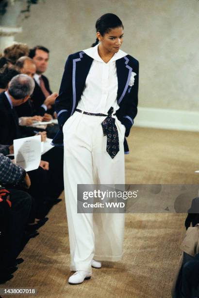 Model wearing a blazer and wide-leg pants from Ralph Lauren's spring/summer 1989 RTW collection on the runway