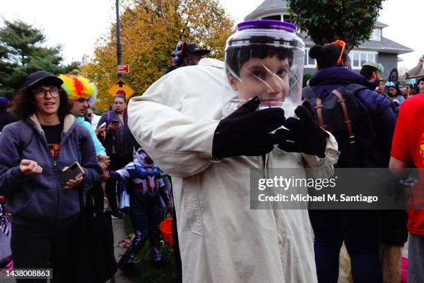 People attend the Prospect Park South Flatbush Halloween Parade on October 31, 2022 in the Flatbush neighborhood of Brooklyn borough in New York...