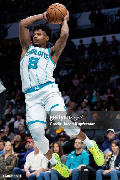 Dennis Smith Jr. #8 of the Charlotte Hornets jumps up to pass the ball in the second quarter during their game against the Sacramento Kings at...