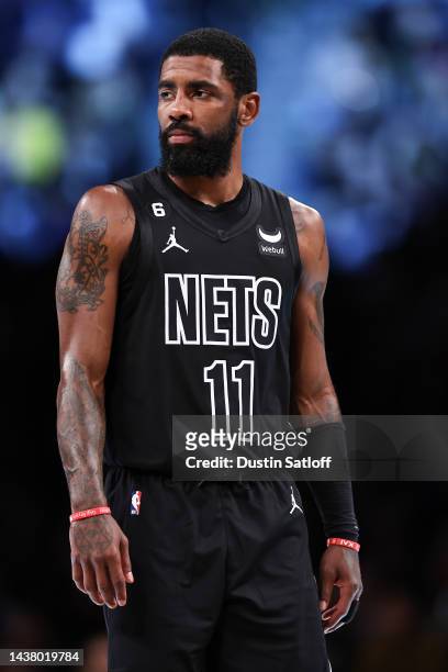 Kyrie Irving of the Brooklyn Nets looks on during a break in the action during the first quarter of the game against the Indiana Pacers at Barclays...