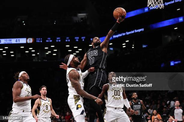 Kyrie Irving of the Brooklyn Nets attempts a layup during the second quarter of the game against the Indiana Pacers at Barclays Center on October 31,...