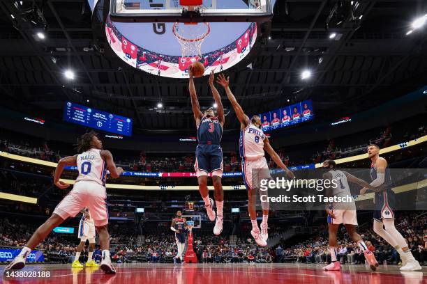 Bradley Beal of the Washington Wizards goes to the basket against DeAnthony Melton of the Philadelphia 76ers during the first half at Capital One...
