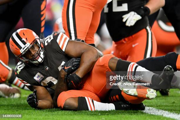 Nick Chubb of the Cleveland Browns scores on a two-point conversion attempt during the first half of the game against the Cincinnati Bengals at...