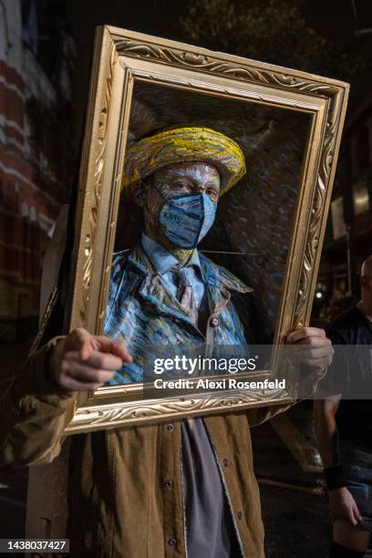 Person dressed as a painting poses at the New York City 49th Annual Village Halloween Parade on October 31, 2022 in New York City. This year’s theme...