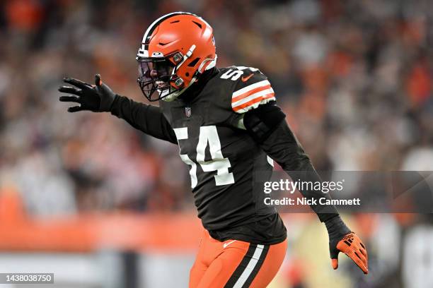 Deion Jones of the Cleveland Browns celebrates after sacking Joe Burrow of the Cincinnati Bengals during the second half of the game at FirstEnergy...