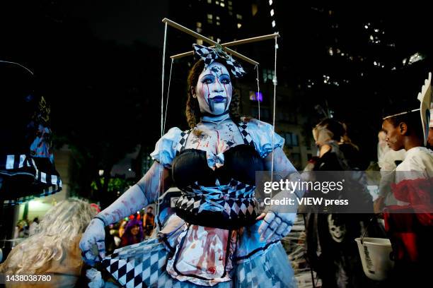 Woman in a puppet costume attends the 49th Annual Halloween parade in Greenwich Village on October 31, 2022 in New York City.