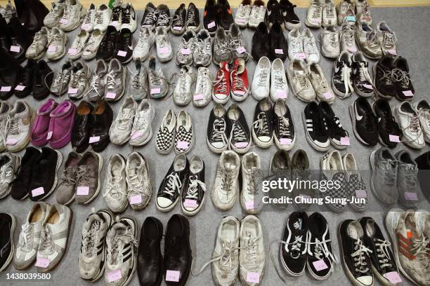 The belongings of victims of the deadly Halloween celebration stampede are shown at a gym on November 01, 2022 in Seoul, South Korea. One hundred and...