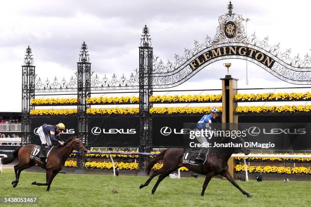 Mark Zahra celebrates when crossing the finish line after riding Gold Trip to win race 7 the Lexus Melbourne Cup during 2022 Melbourne Cup Day at...