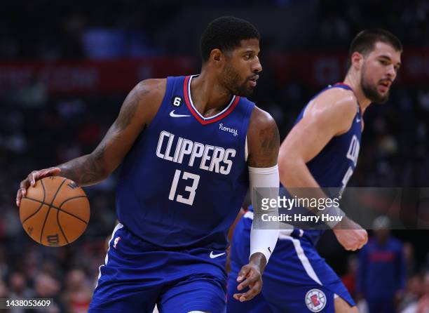 Paul George of the LA Clippers and Ivica Zubac run a pick and roll during the second half in a 95-93 Clipper win over the Houston Rockets at...