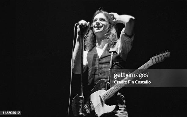 1st DECEMBER: Francis Rossi from Status Quo performs live on stage in London in December 1977.