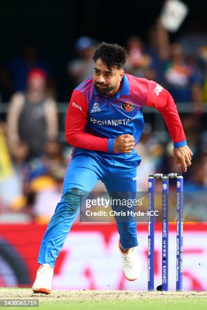 Rashid Khan of Afghanistan bowls during the ICC Men's T20 World Cup match between Afghanistan and Sri Lanka at The Gabba on November 01, 2022 in...