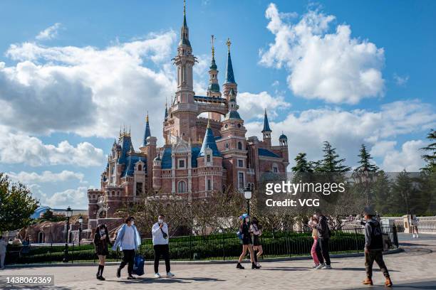 Tourists visit Shanghai Disney Resort on October 31, 2022 in Shanghai, China. Shanghai Disney Resort announced its temporary closure on Monday after...