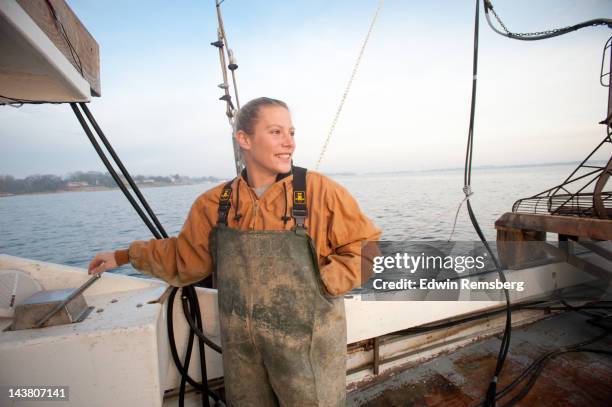 portrait of a female waterman. - fishing industry stock-fotos und bilder