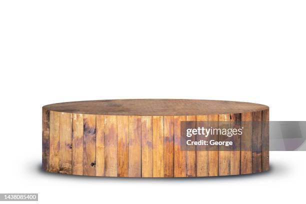 wood cylindrical podium and white background. - piedistallo foto e immagini stock