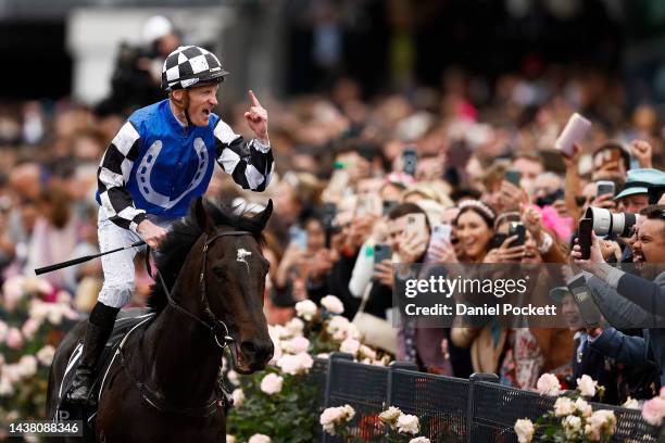 Mark Zahra riding Gold Trip celebrates as he returns to scale after winning race seven, the Lexus Melbourne Cupduring 2022 Lexus Melbourne Cup Day at...