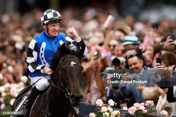 Mark Zahra riding Gold Trip celebrates as he returns to scale after winning race seven, the Lexus Melbourne Cupduring 2022 Lexus Melbourne Cup Day at...