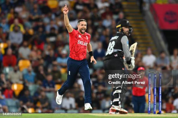 Chris Woakes of England celebrates dismissing Devon Conway of New Zealand during the ICC Men's T20 World Cup match between England and New Zealand at...