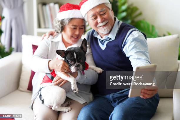 family enjoying selfie photography while celebrate christmas event - festival of remembrance 2019 stock pictures, royalty-free photos & images