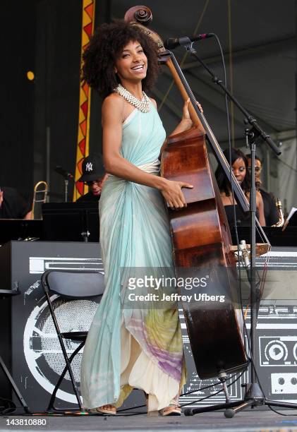 Musician Esperanza Spalding performs during the 2012 New Orleans Jazz & Heritage Festival at the Fair Grounds Race Course on May 3, 2012 in New...