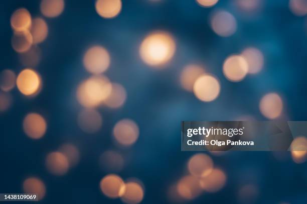 christmas festive bokeh background. - blue confetti stockfoto's en -beelden