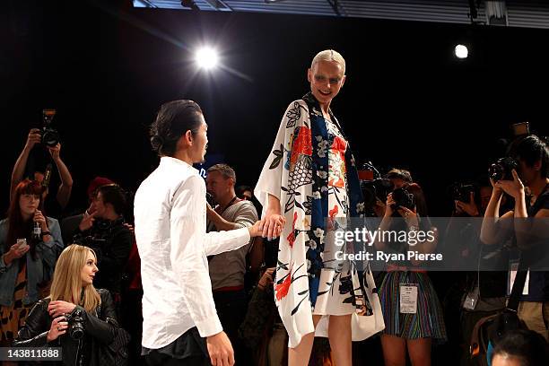 Designer Akira Isogawa on stage with models during the show by Akira on day five of Mercedes -Benz Fashion Week Australia Spring/Summer 2012/13 at...
