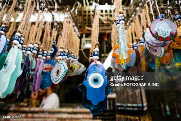 hamsa souvenirs in jaffa flee market  in tel aviv, israel - hamsa stock pictures, royalty-free photos & images