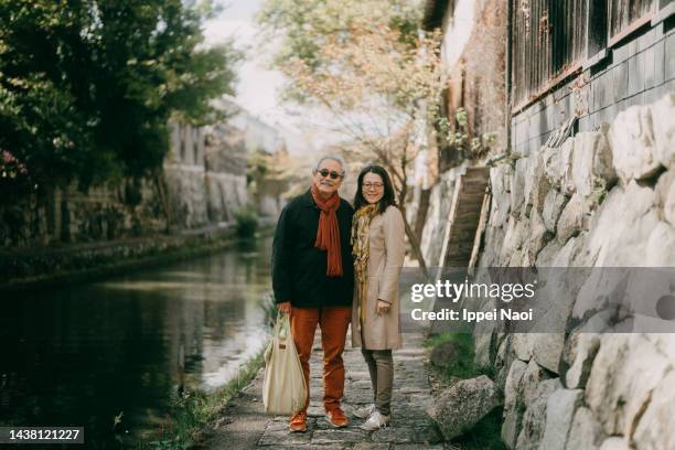 senior father and adult daughter, ohmihachiman, japan - shiga prefecture ストックフォトと画像