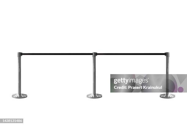 velvet rope isolated on white background. clipping path - begrenzung stock-fotos und bilder