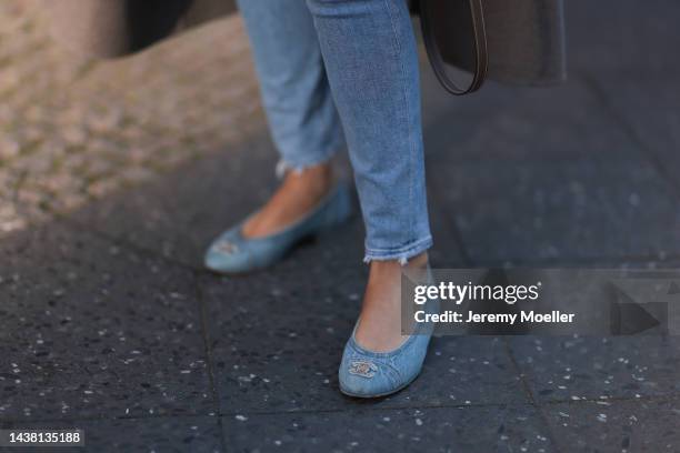 Leo Eberlin seen wearing Chanel denim ballerinas and Citizens of humanity blue jeans on October 30, 2022 in Berlin, Germany.