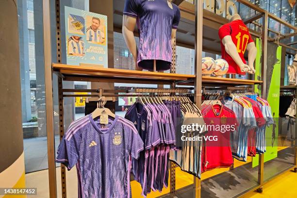 Jerseys of Argentina national football team and Germany national football team are on sale at an Adidas store on November 1, 2022 in Shanghai, China....