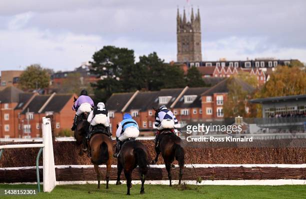 Stage Star, ridden by Harry Cobden leads the field as they pass the grandstand during The Jewson Stratford-Upon-Avon Stan Mellor Memorial Novices'...