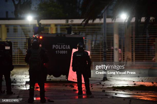 Colombia's anti-riot police squadron formerly known as ESMAD clashes with demonstrators as protests rise in Bogota, Colombia amid the liberation of...