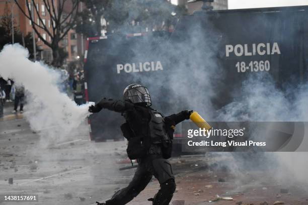 Colombia's anti-riot police squadron formerly known as ESMAD clashes with demonstrators as protests rise in Bogota, Colombia amid the liberation of...